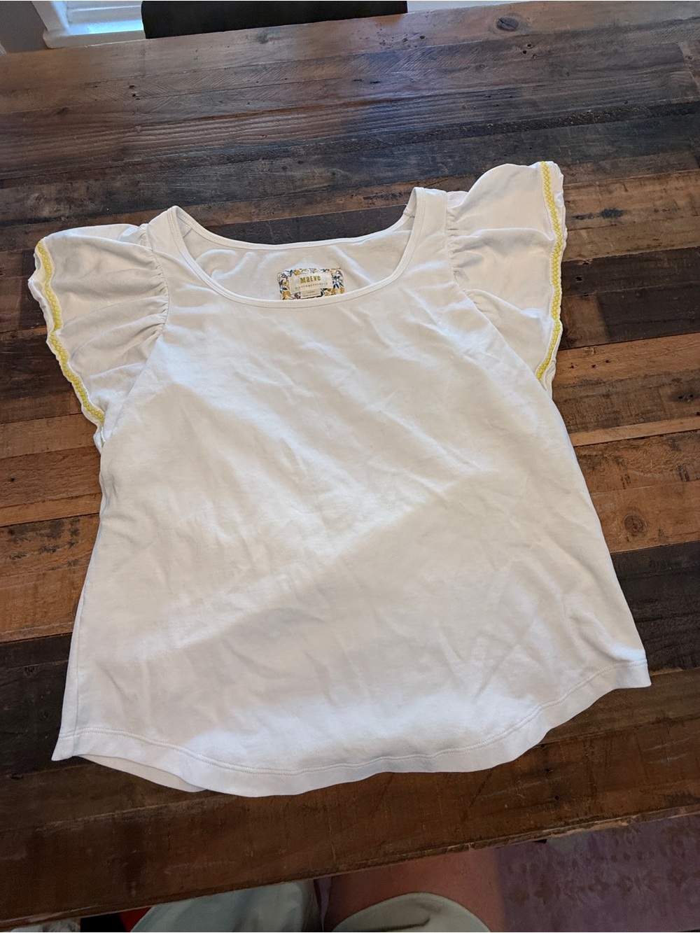 Maeve Anthropologie white top with yellow stitching